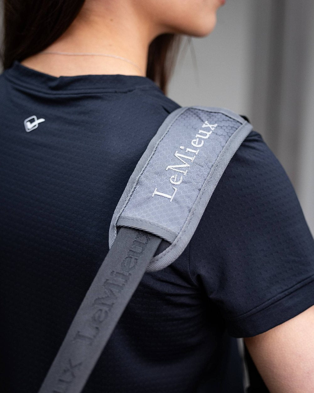 Black coloured LeMieux Grooming Bag on blurry background