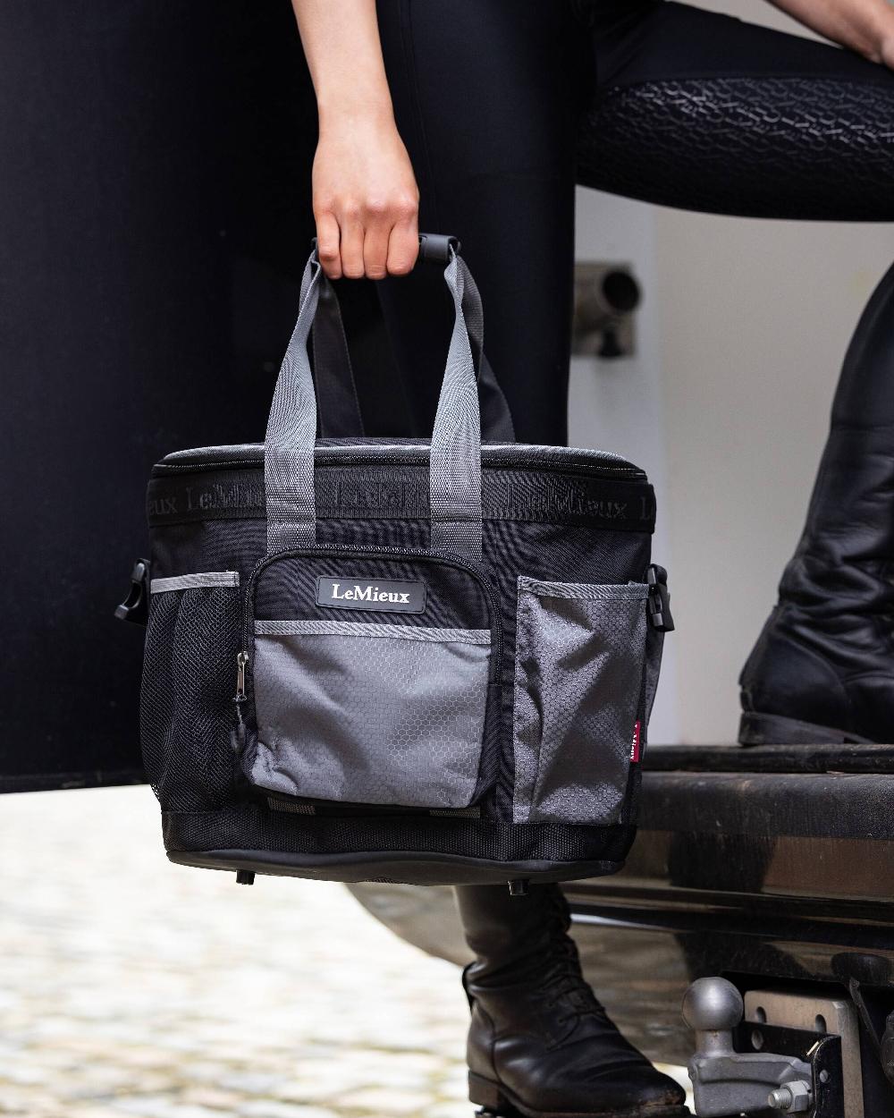 Black coloured LeMieux Grooming Bag on black background