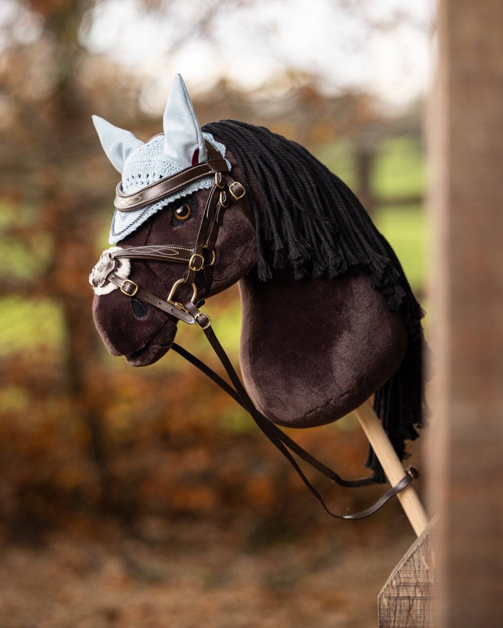 Freya Coloured LeMieux Hobby Horse On A Outer Yard Background