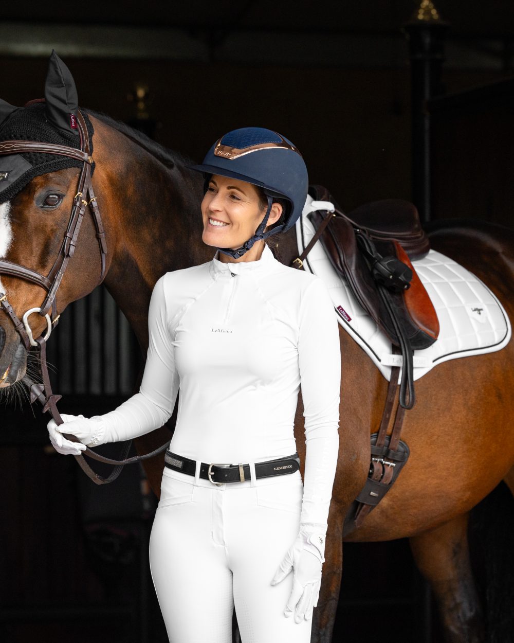 White Coloured LeMieux Loire Close Contact Square On A Stable Background