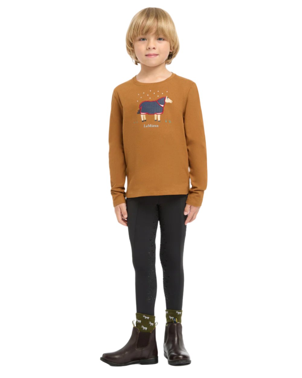 Ginger Coloured LeMieux Mini Jessie Long Sleeve Top On A White Background