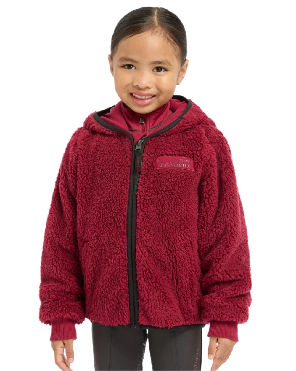 Ember Coloured LeMieux Mini Teagan Fleece Jacket On A White Background