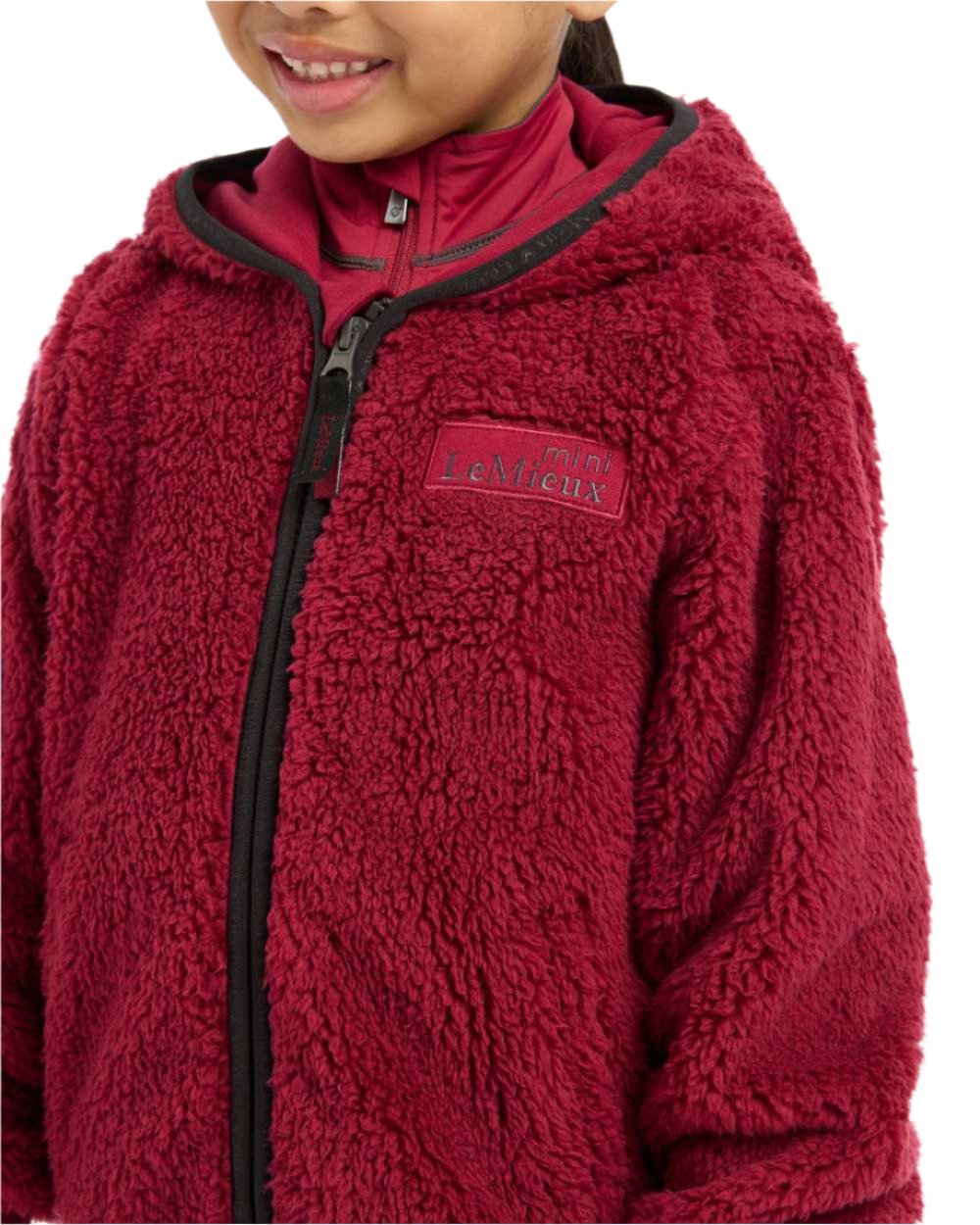 Ember Coloured LeMieux Mini Teagan Fleece Jacket On A White Background