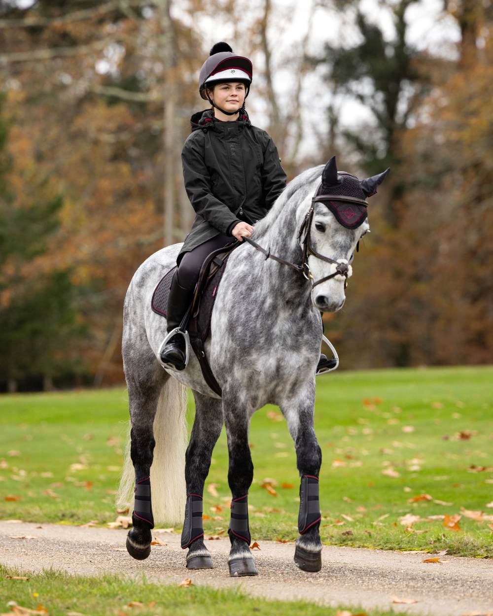 Cinder Coloured LeMieux Pippa Hat Silk On A Park Background