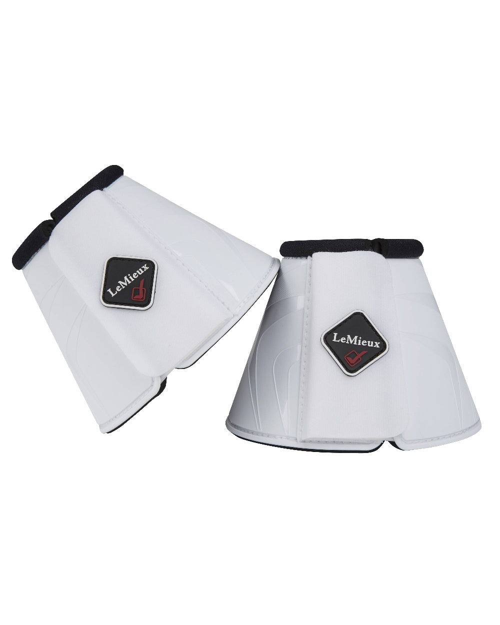 White coloured LeMieux ProShell Over Reach Boots on white background