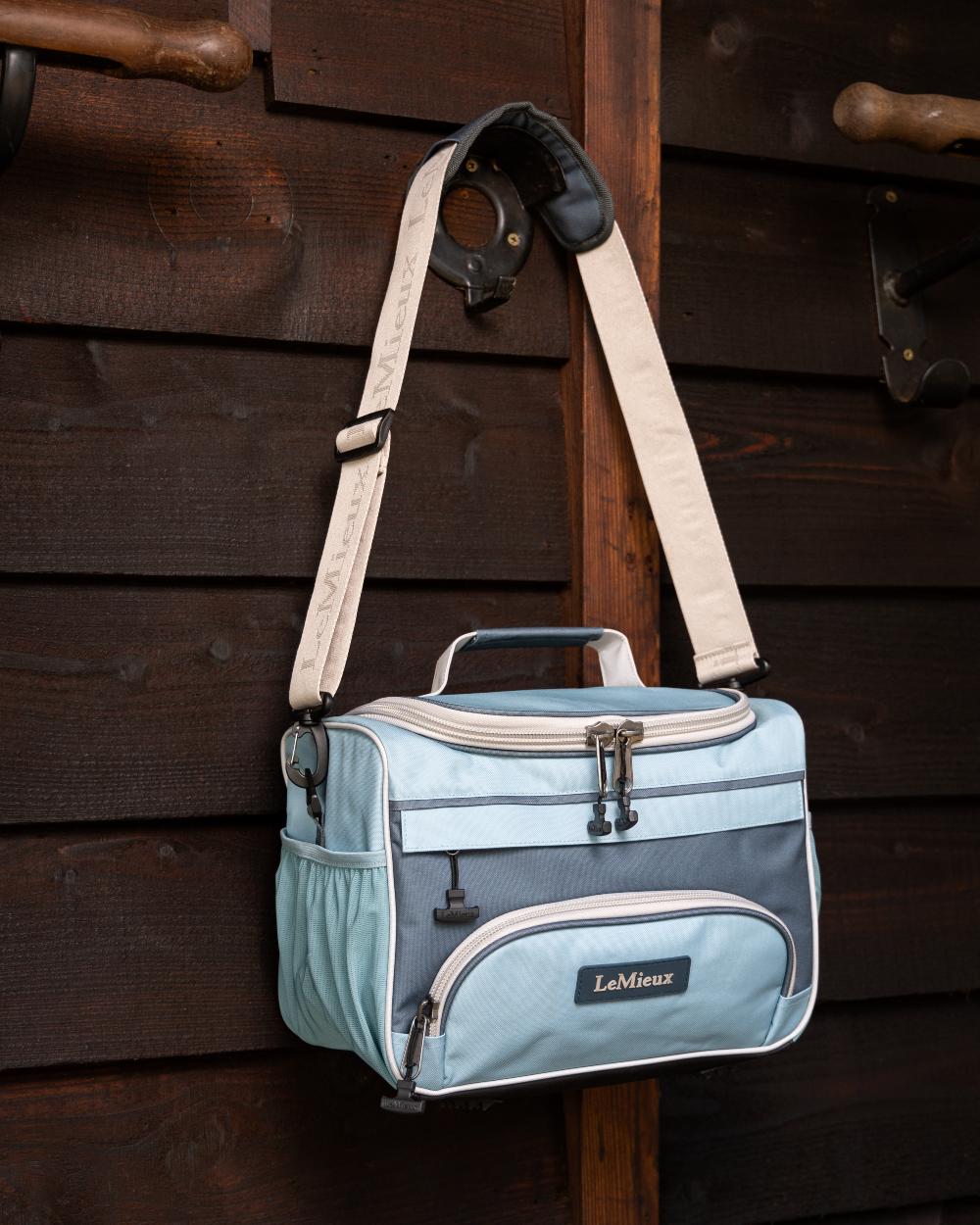 Petrol Coloured LeMieux ProKit Lite Grooming Bag On A Stable Background