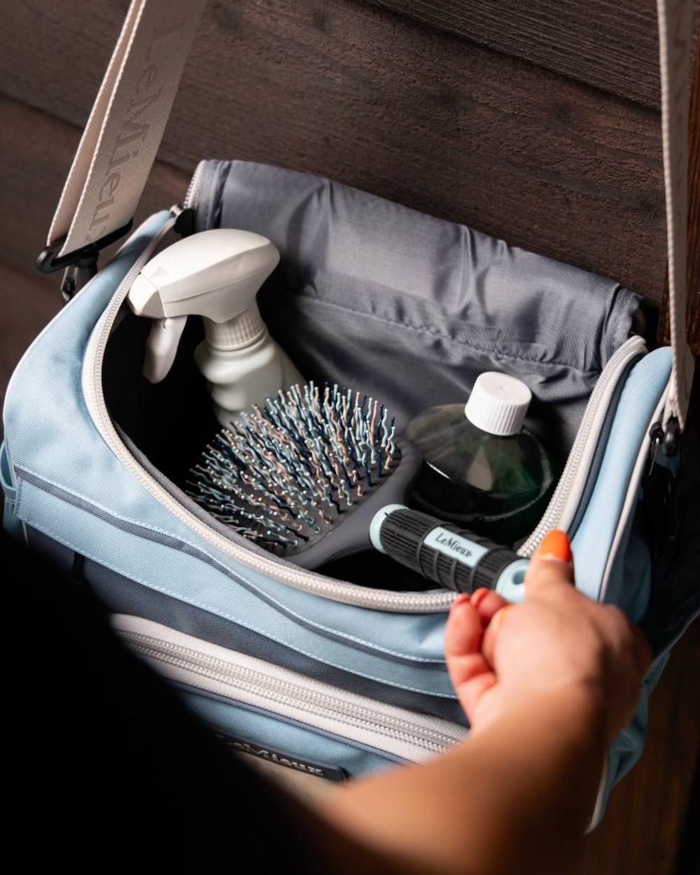 Petrol Coloured LeMieux ProKit Lite Grooming Bag On A Stable Background