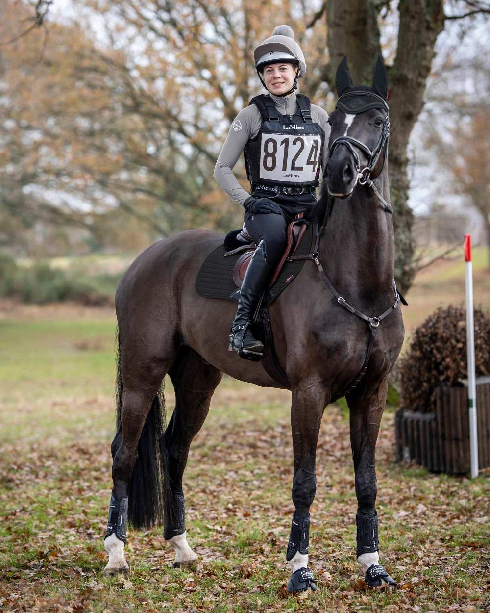 Black coloured LeMieux Suede Close Contact Squares on field background