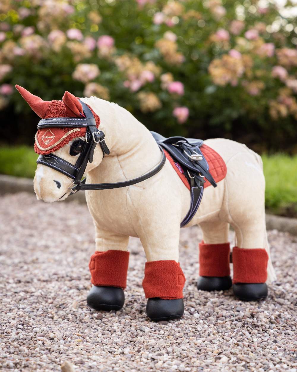 LeMieux Toy Pony Popcorn on blurry green background