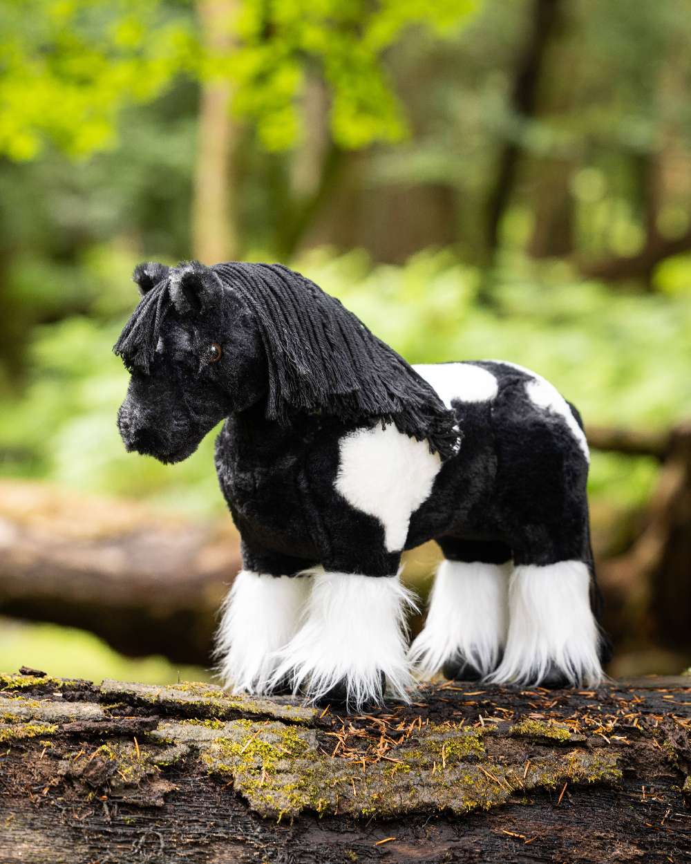 LeMieux Toy Pony Razzle on blurry forest background