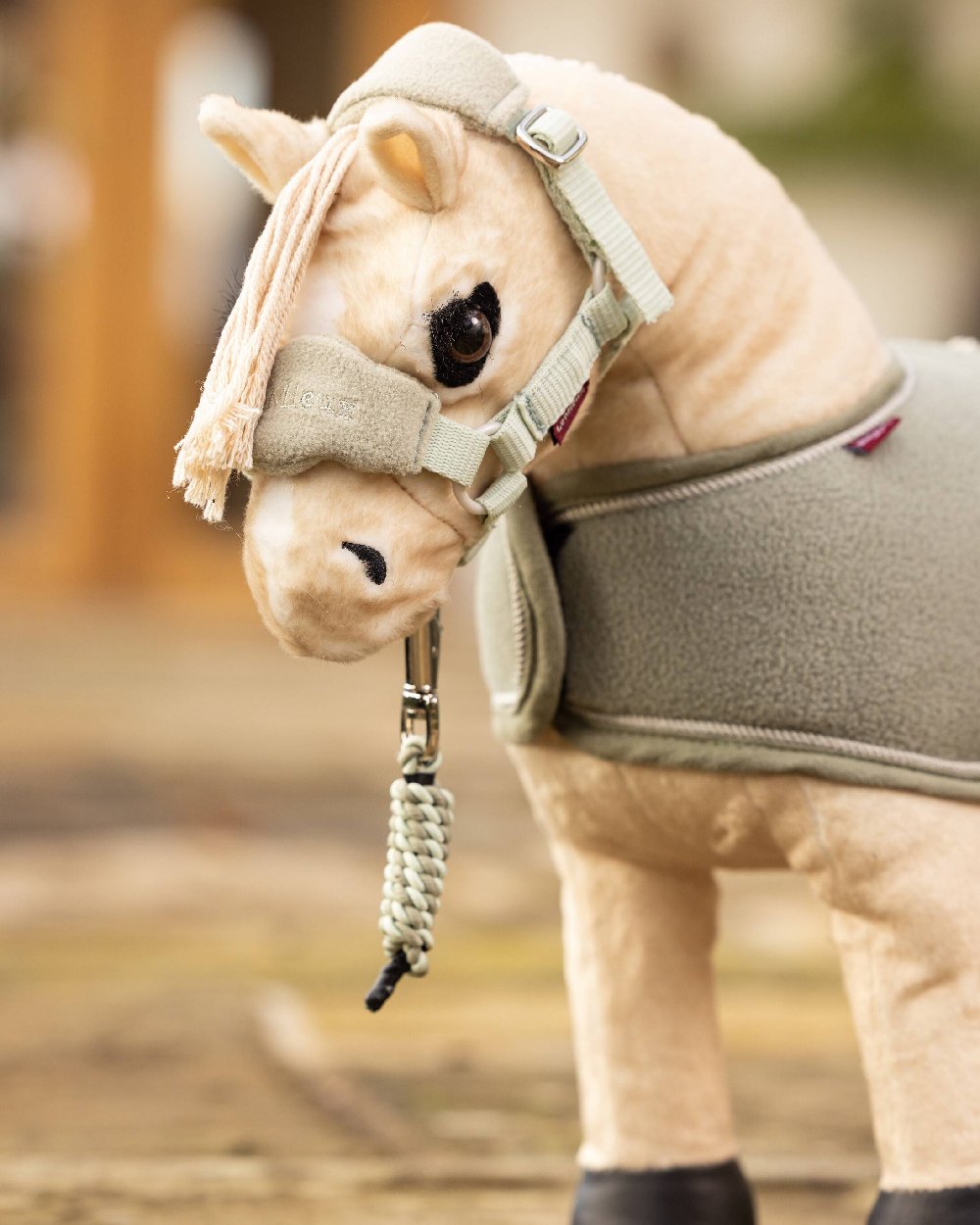 Fern coloured LeMieux Toy Pony Vogue Headcollar on blurry background