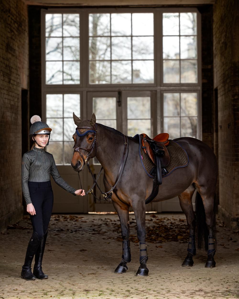 Alpine Coloured LeMieux Young Rider Casey Base Layer On A Stable Background