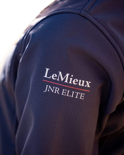 Navy coloured LeMieux Young Rider Elite Soft Shell Jacket on white background 