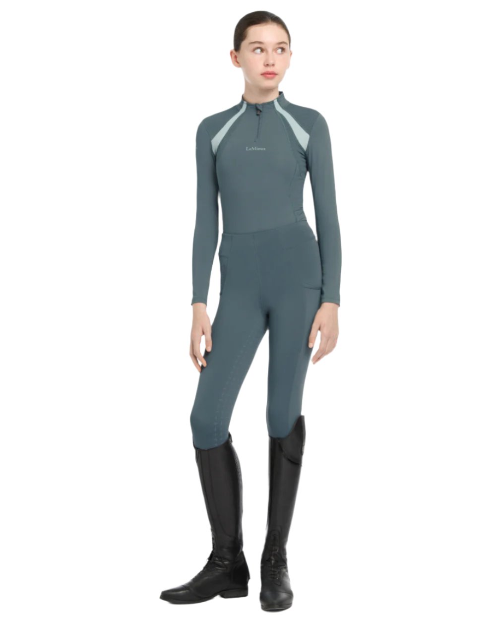 Petrol Coloured LeMieux Young Rider Mia Mesh Base Layer On A White Background