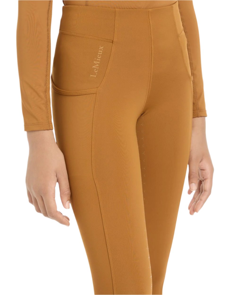 Ginger Coloured LeMieux Young Rider Orla Pull Ons On A White Background