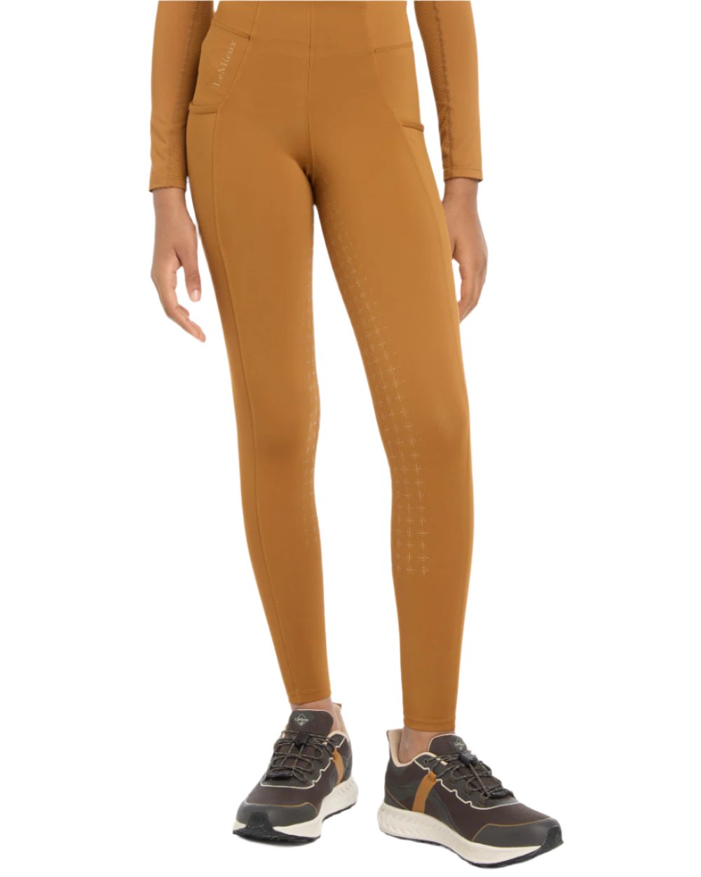 Ginger Coloured LeMieux Young Rider Orla Pull Ons On A White Background