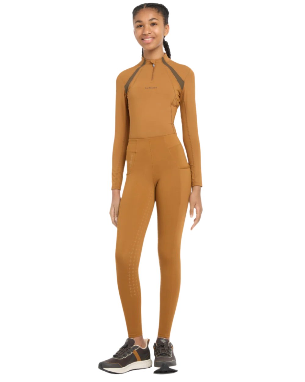 Ginger Coloured LeMieux Young Rider Orla Pull Ons On A White Background