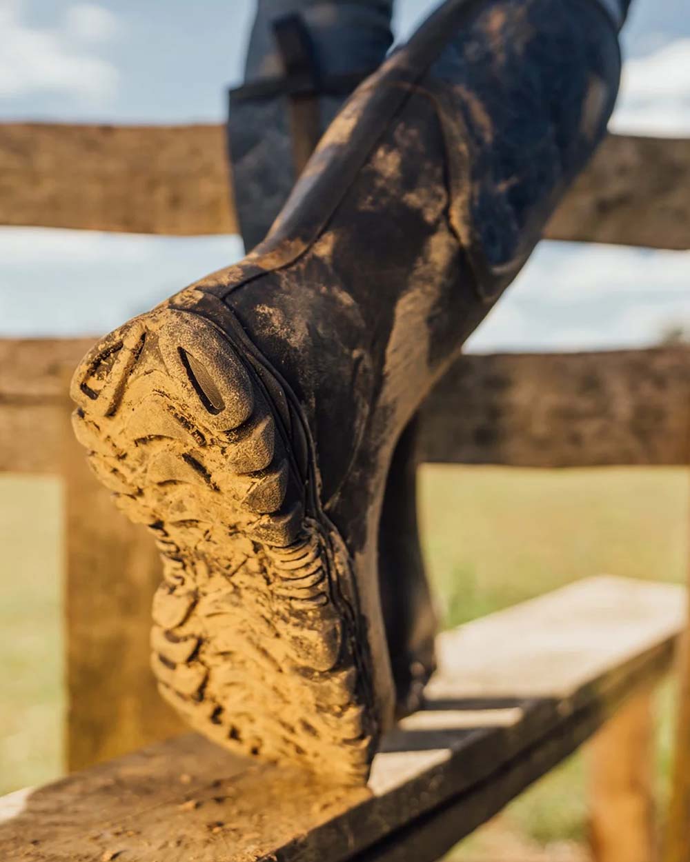Navy Topography Muck Boots Womens Artic Sport II Tall Wellingtons on Blurry Fence background