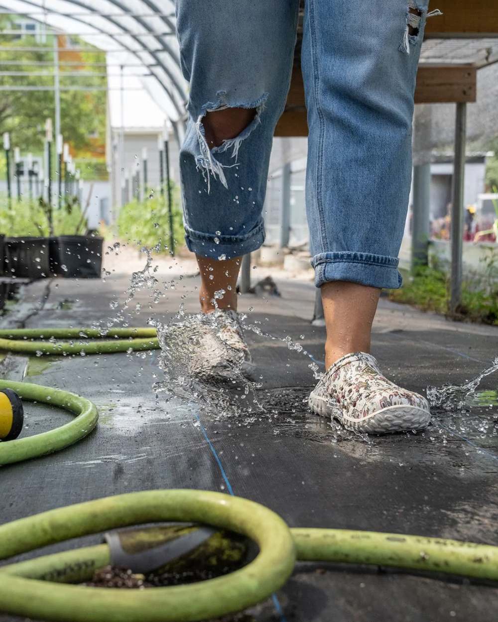 Light Grey Floral Print Coloured Muck Boots Womens Muckster Lite Clogs On A Street Background