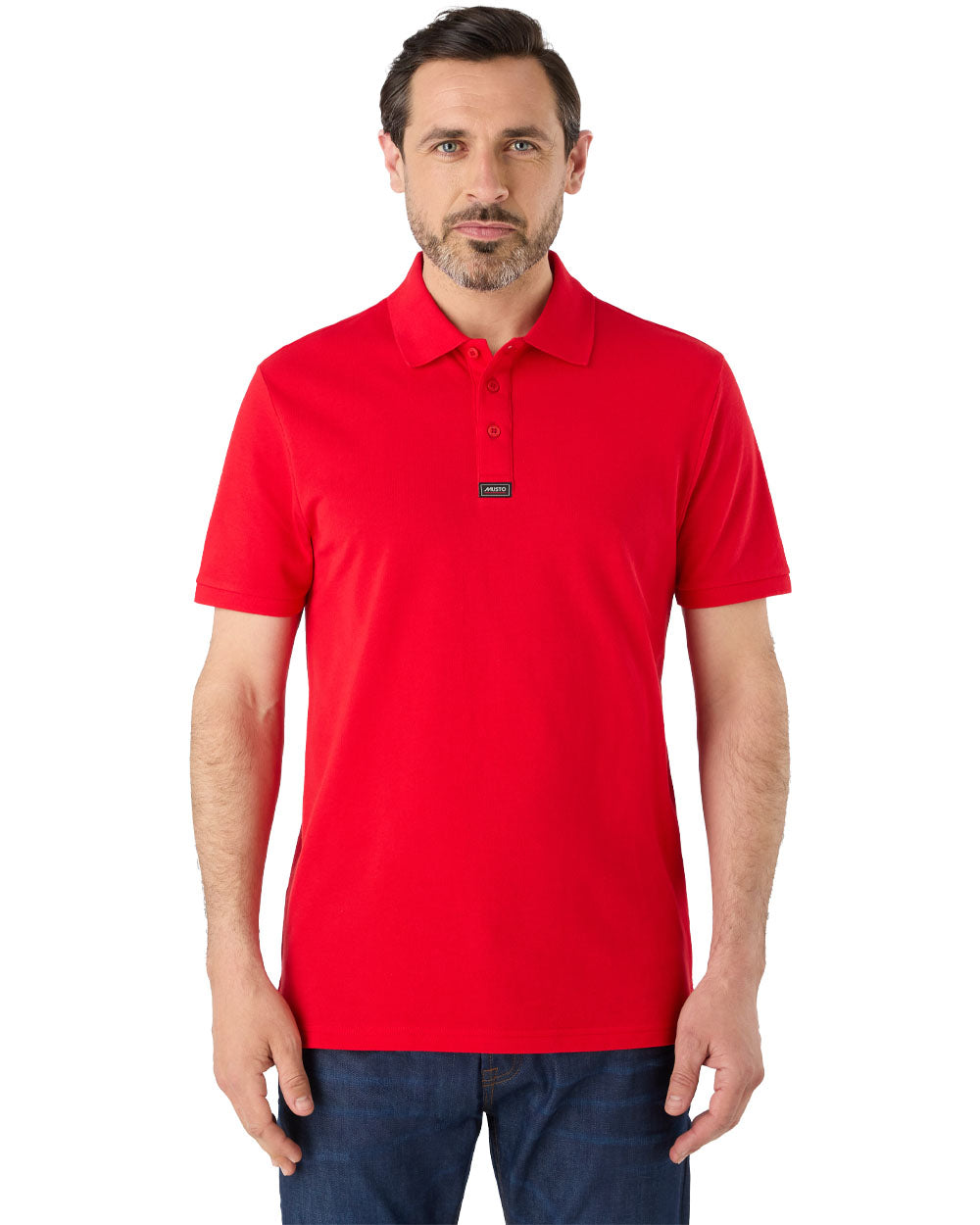 True Red coloured Musto Essential Pique Polo Shirt on White background