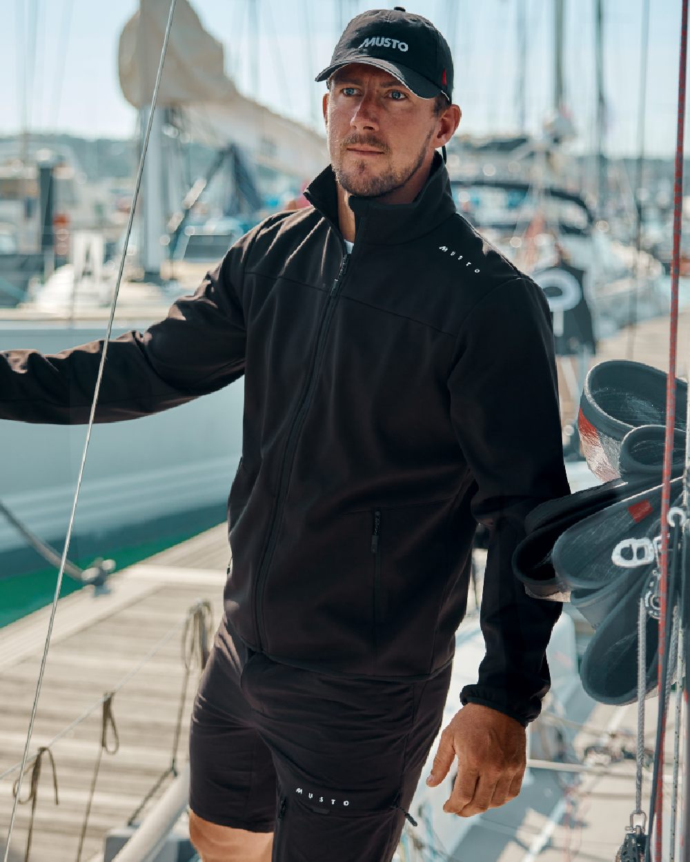 Black ColouredMusto Mens Evo Crew Softshell Jacket on Blurry Background