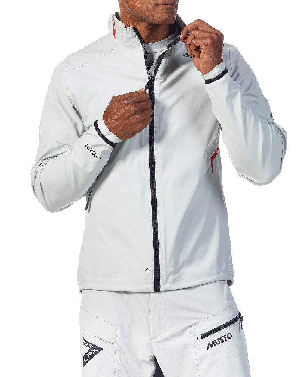 Platinum coloured Musto Mens LPX GTX Infinium Foiling Jacket on white coloured 