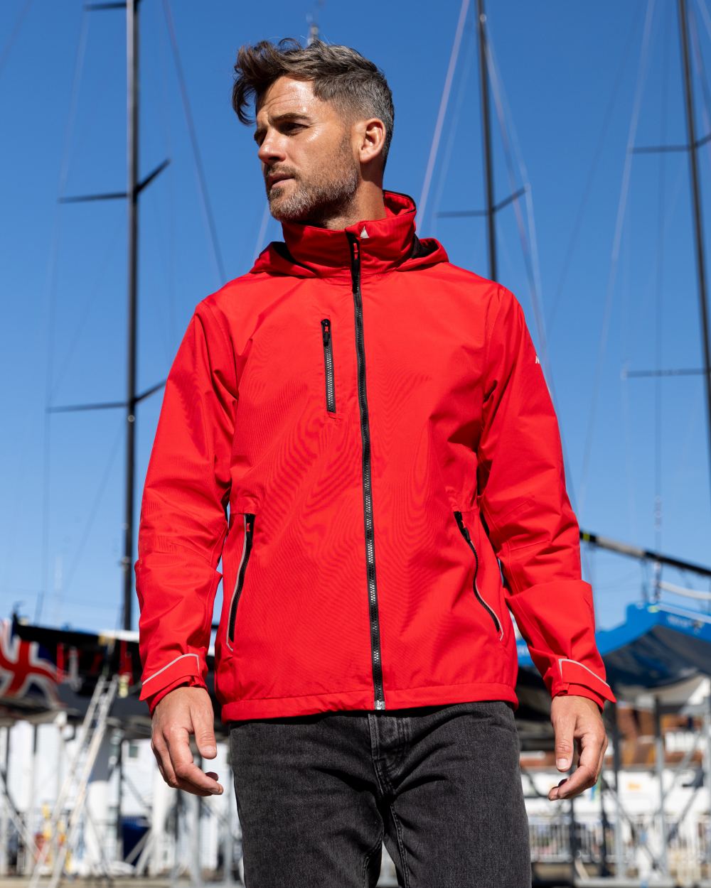 True Red Coloured Musto Mens Sardinia Jacket on Outdoor Background