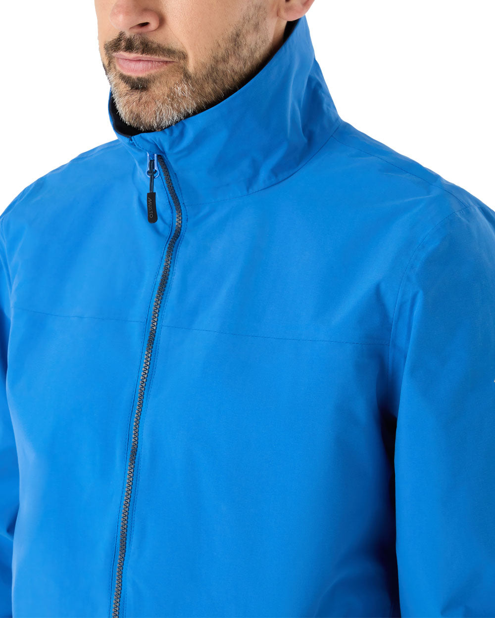 Aruba Blue coloured Musto Snug Blouson Jacket on White background