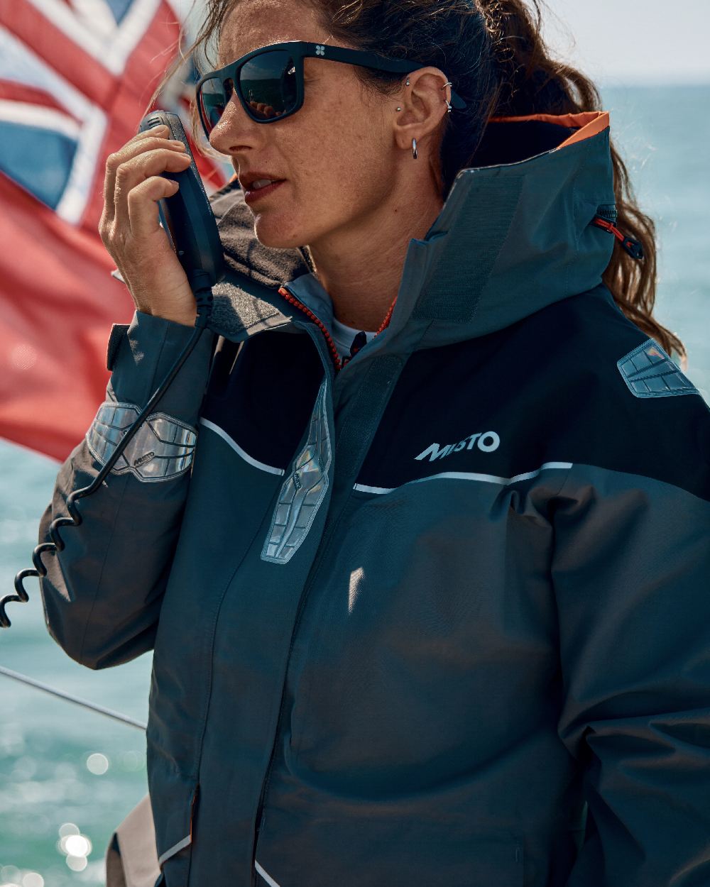 Charcoal Coloured Musto Womens Br3 Pertex Offshore Jacket on Blurry Background