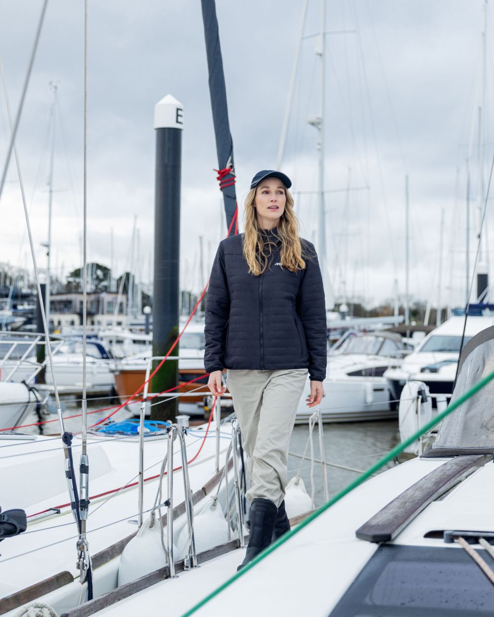 True Navy Coloured Musto Womens Solent Primaloft Insulator on Beach Background