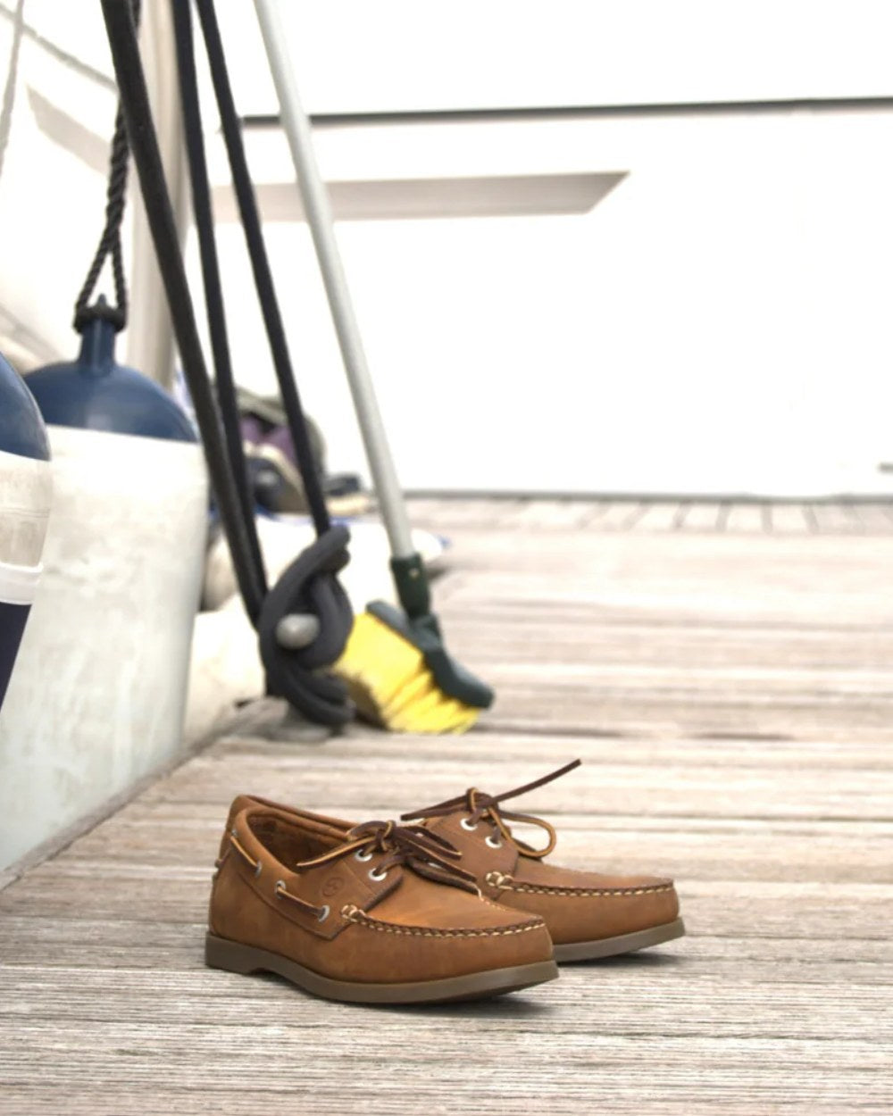 Havana Coloured Orca Bay Creek Womens Deck Shoes On A Deck Background