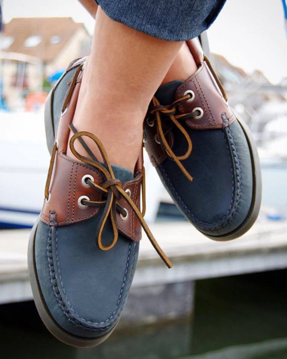 Navy Coloured Orca Bay Oakland Womens Deck Shoes On A Coastal Background