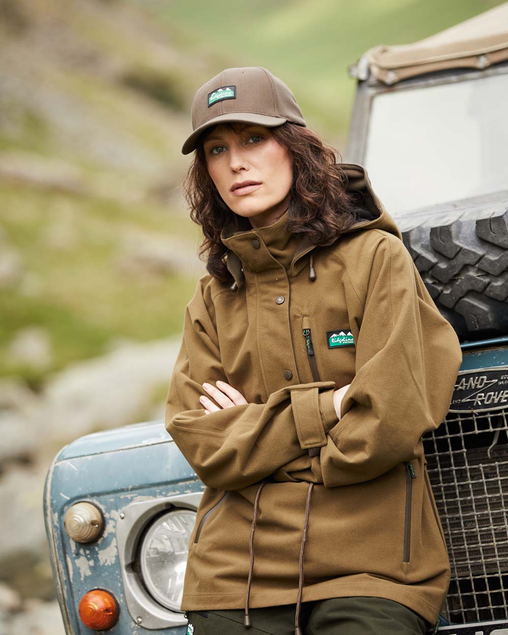 Teak Coloured Ridgeline Ladies Monsoon II Waterproof Smock On A Hill Background