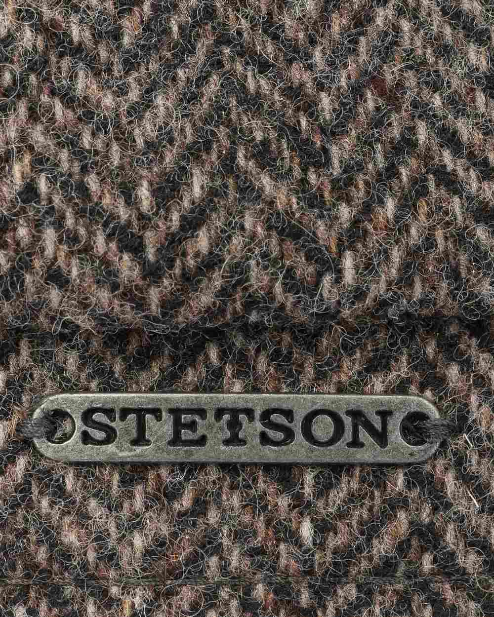Dark Brown Coloured Stetson Hatteras Classic Wool Flat Cap On A White Background