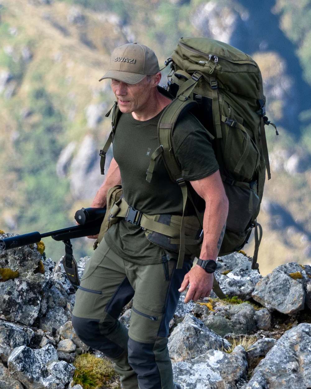 Olive Coloured Swazi The Hoodoo Long Sleeve T-Shirt On A Mountain Background