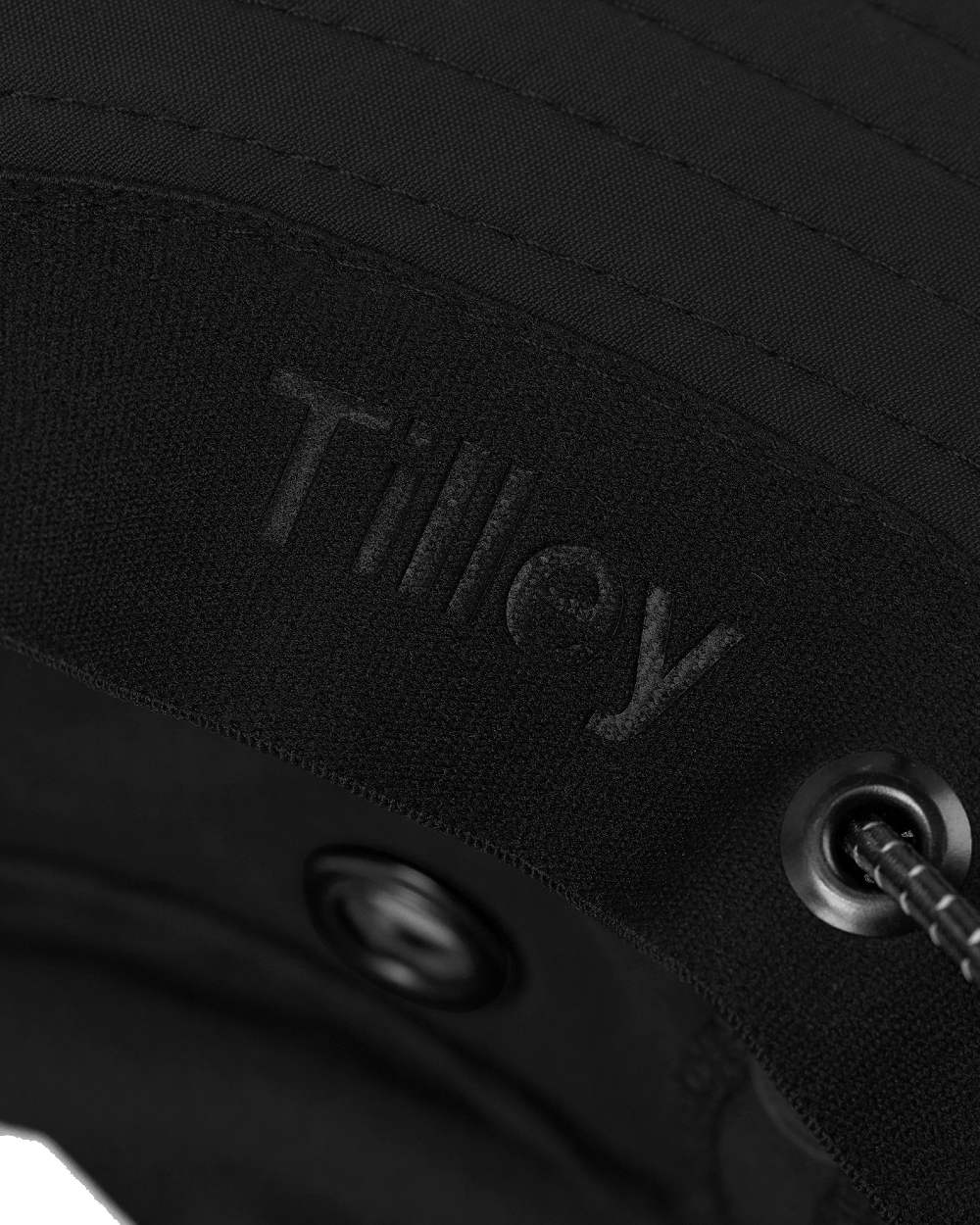 Black Coloured Tilley Rain Hat On A White Background
