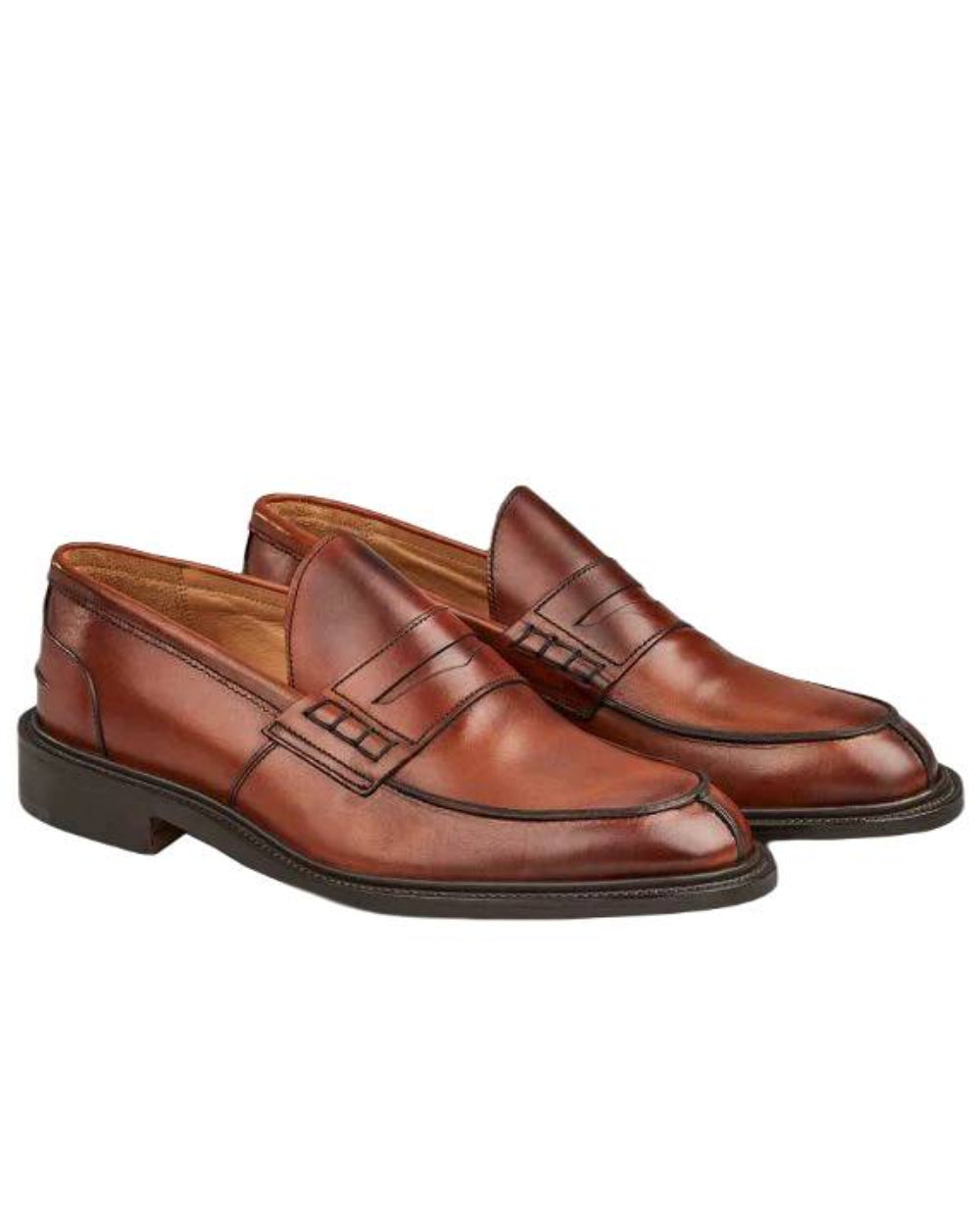 Chestnut Burnished Coloured Trickers James Leather Sole Penny Loafer On A White Background