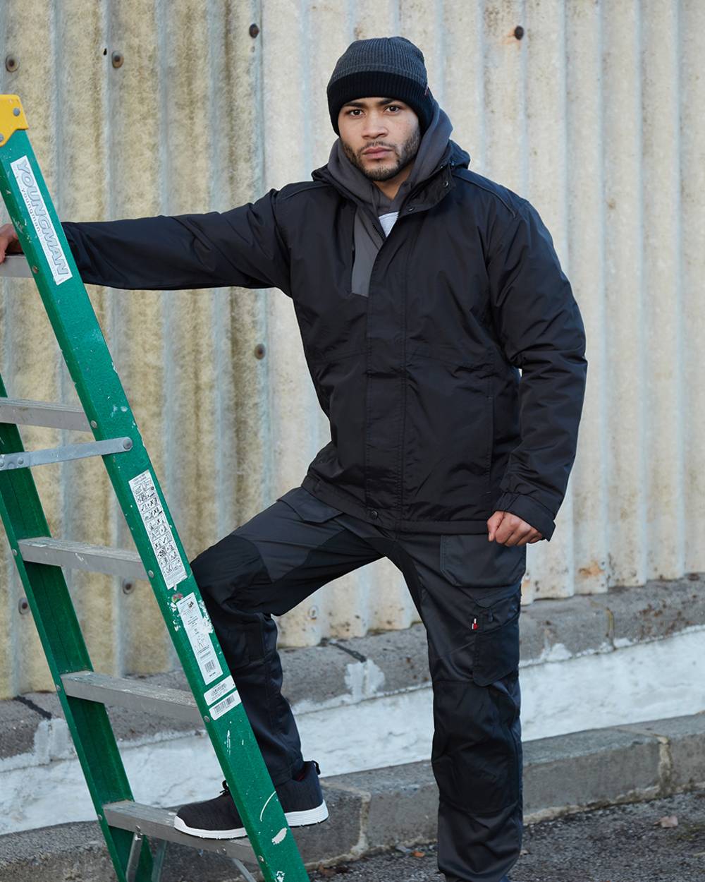 Black Coloured TuffStuff Newport Jacket On A Street Background