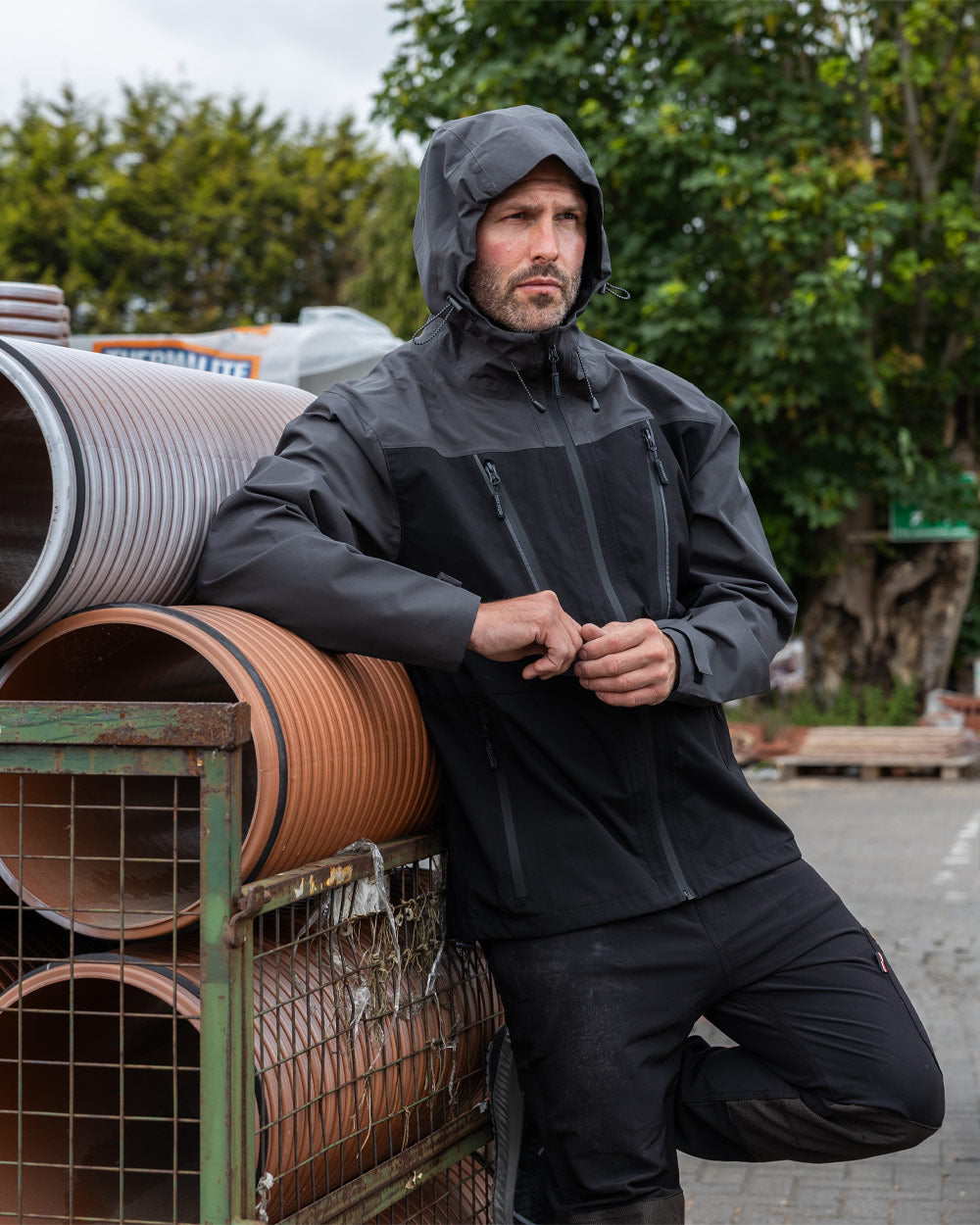 Black coloured TuffStuff ProShell Jacket on urban background