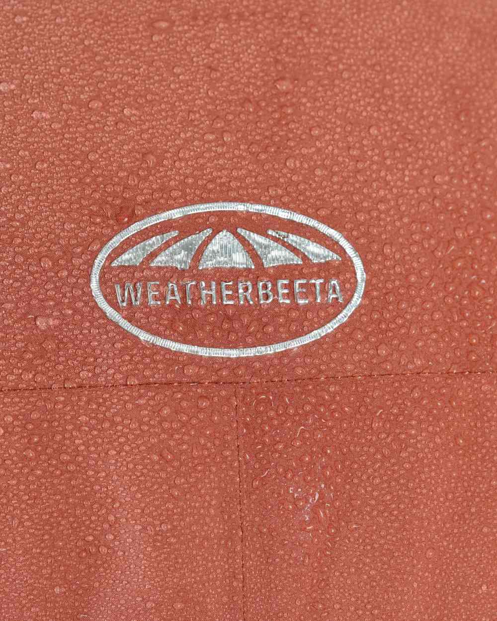 Redwood Coloured WeatherBeeta Kyla II Waterproof Jacket On A White Background