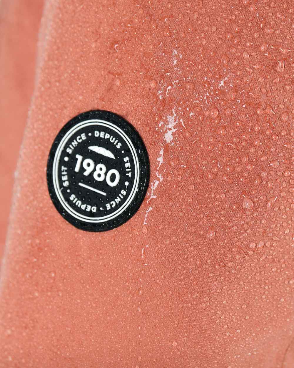 Redwood Coloured WeatherBeeta Kyla II Waterproof Jacket On A White Background