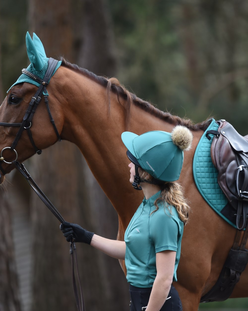 Turquoise Coloured WeatherBeeta Prime Short Sleeve Top On A White Background