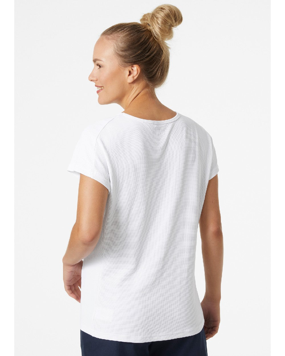 White coloured Helly Hansen womens crewline quick dry top on grey background