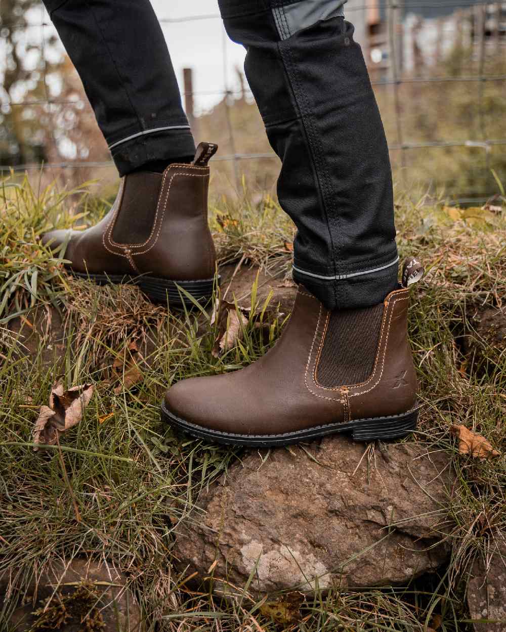 Rustic Brown Coloured Xpert Children Heritage Farrier Chelsea Boots on Outdoor Background