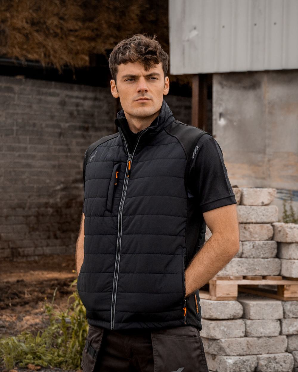 Black Coloured Xpert Mens Pro Rip-Stop Panelled Bodywarmer on Outdoor Background