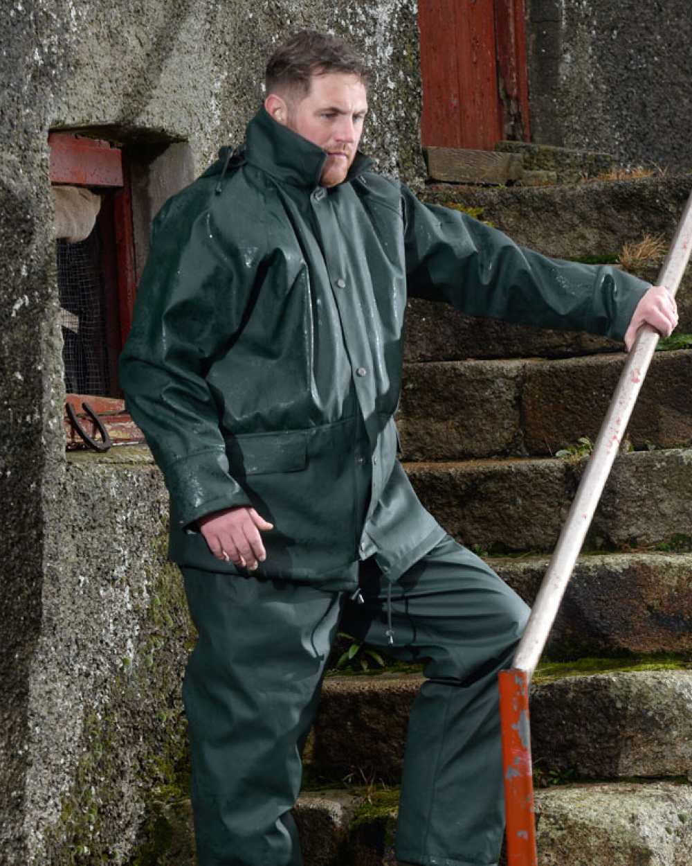 Green Coloured Xpert Mens Swampmaster No-Sweat Stormgear Waterproof Jacket on Outdoor Background