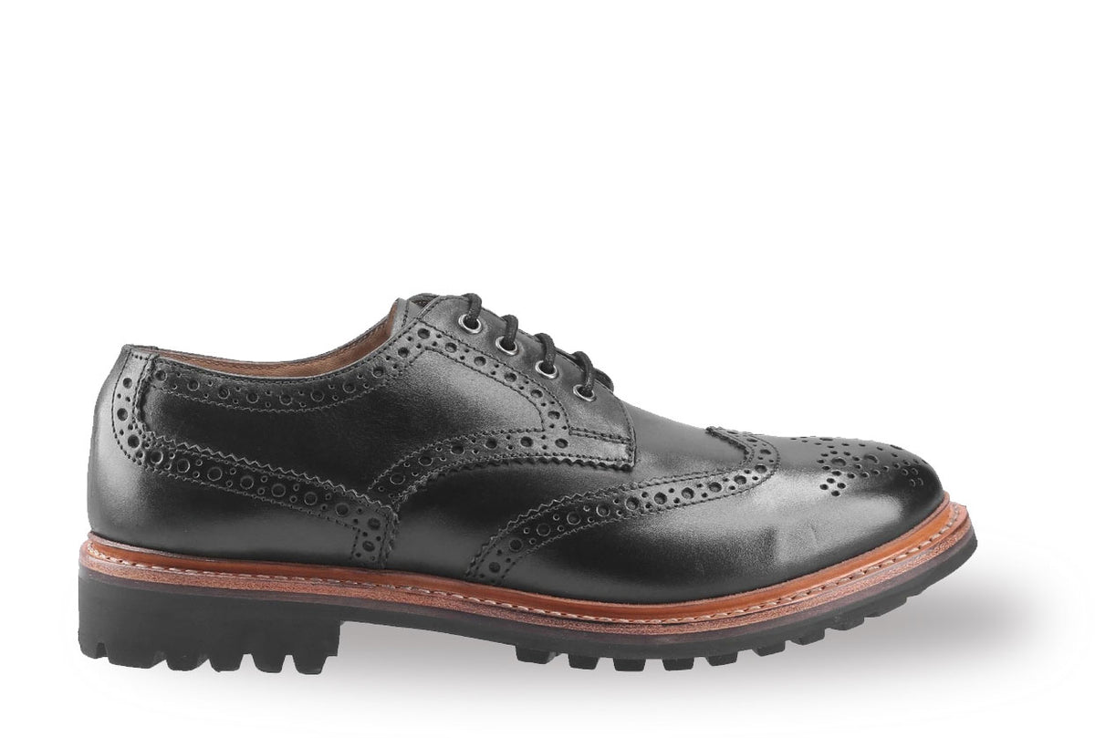 Thick gripping heavy lug sole shoe
