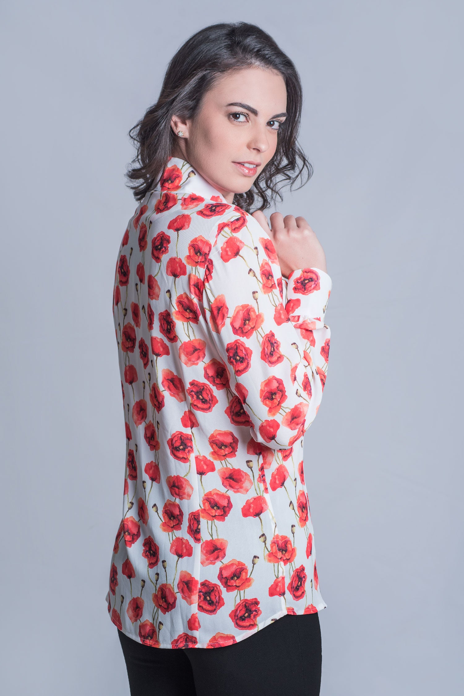 A beautifully flattering ladies blouse with an exquisite Poppy design