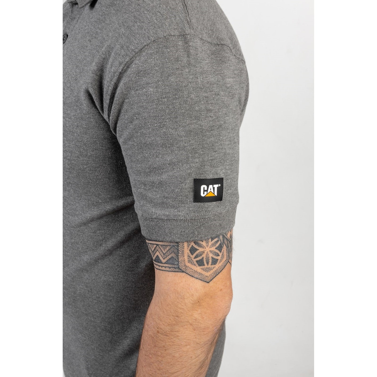 Caterpillar Essentials Polo Shirt. Dark Heather Grey. Side View Sleeve.