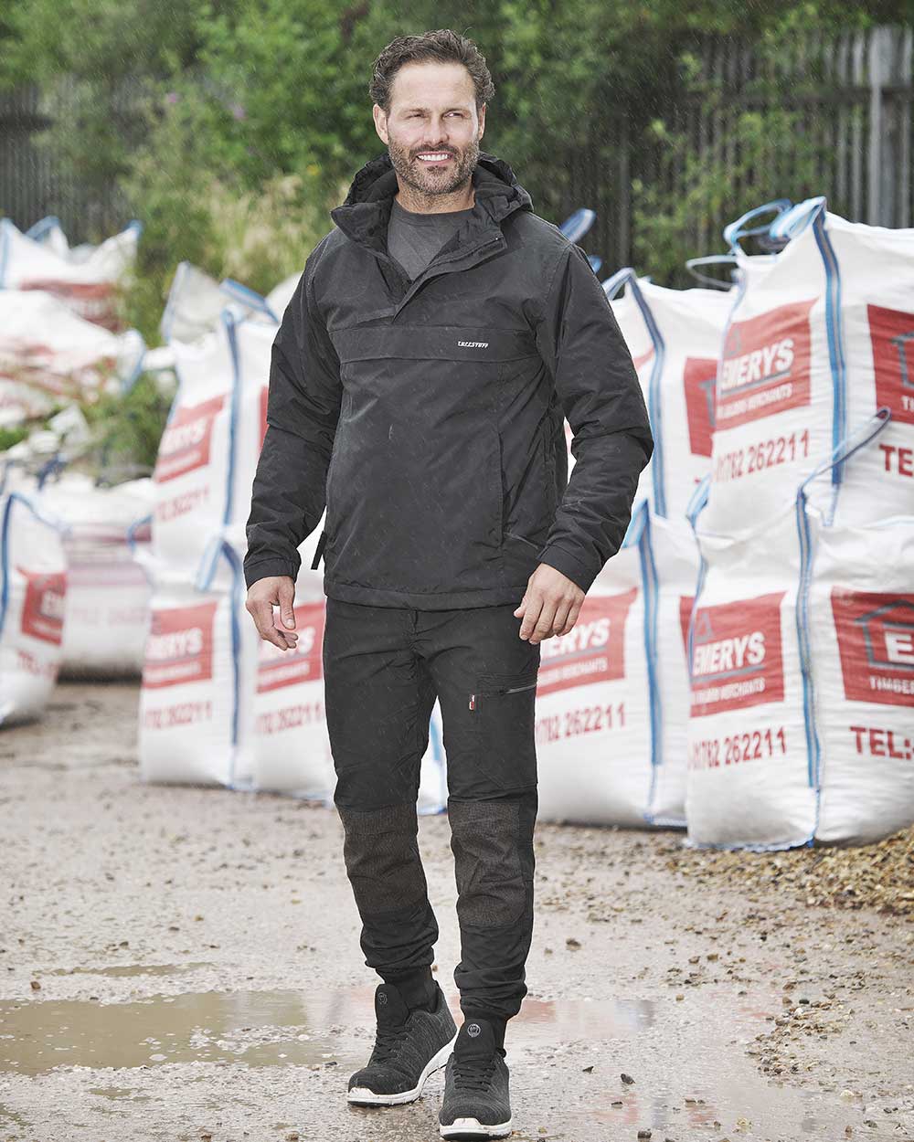 Black Coloured TuffStuff Hyperflex Trouser On A Street Background